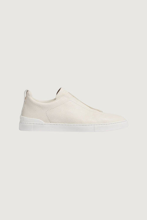 Triple stitch low-top sneakers in off white