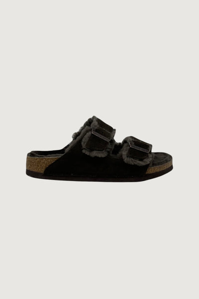 Quattro Stagioni black suede Arizona shearling sandals with adjustable buckles and cozy shearling lining.