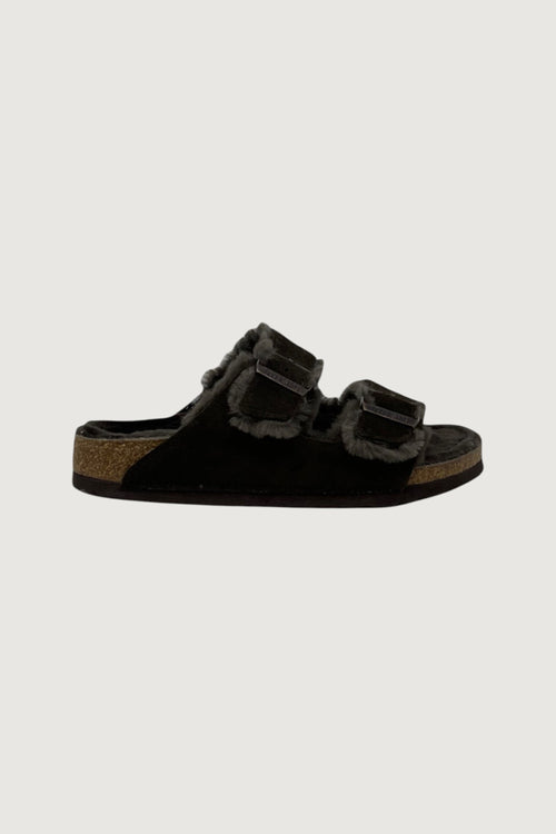 Quattro Stagioni black suede Arizona shearling sandals with adjustable buckles and cozy shearling lining.