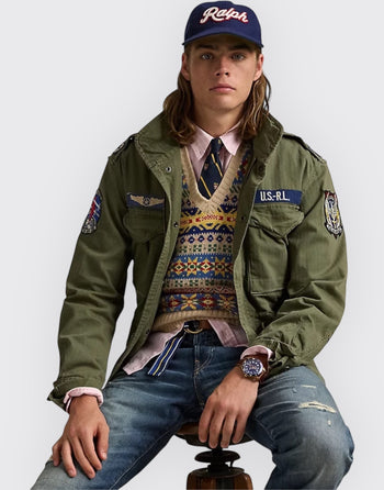 Quattro Stagioni olive green cotton field jacket with bi-swing design and military-inspired patches.