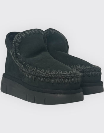 Quattro Stagioni black suede Eskimo bounce sneakers with thick stitching and platform sole.