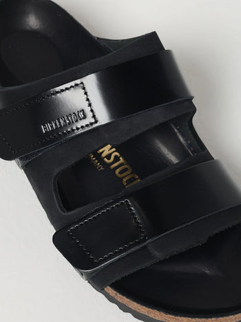Quattro Stagioni black leather double strap Birkenstock sandals with adjustable buckles.