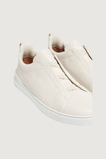 Triple stitch low-top sneakers in off white - 3