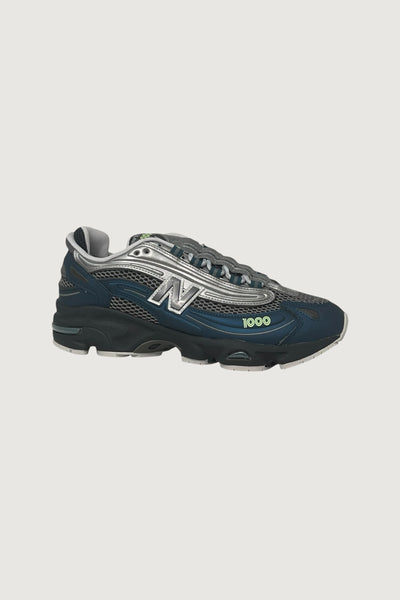 Quattro Stagioni Lifestyle 1000 navy and silver mesh sneakers with chunky sole and neon green accents.