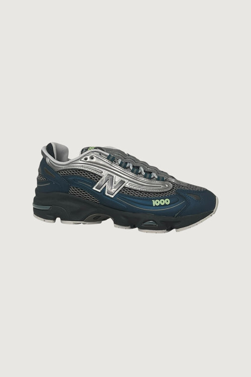 Quattro Stagioni Lifestyle 1000 navy and silver mesh sneakers with chunky sole and neon green accents.