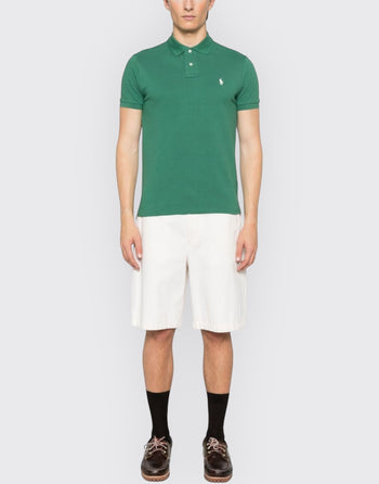 Quattro Stagioni green piqué slim-fit polo shirt with short sleeves and a small white embroidered logo.
