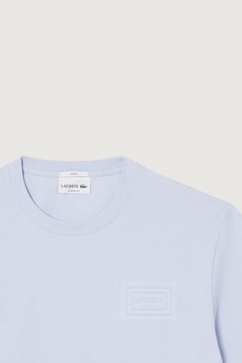 LACOSTE-TH0753 J2G -T-shirt in jersey con marchio goffrato