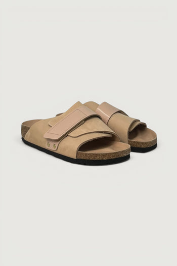 Quattro Stagioni Kyoto beige suede slide sandals with adjustable straps and cork sole.