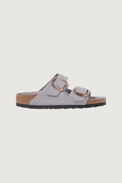 Quattro Stagioni Arizona big buckle shine grey leather sandals with gold hardware and cork footbed.