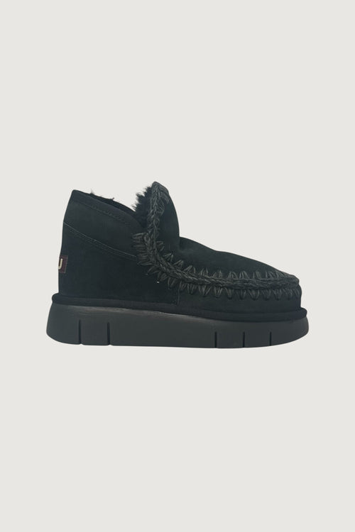 Quattro Stagioni black suede Eskimo bounce sneaker with shearling lining and braided detail.