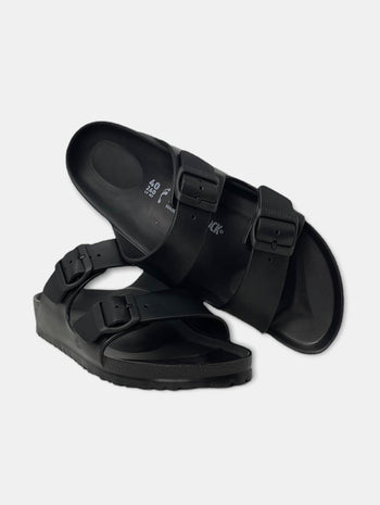 Quattro Stagioni black EVA Birkenstock Arizona sandals with two adjustable buckles and anatomically shaped footbed.