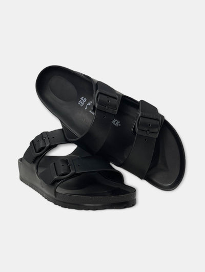Quattro Stagioni black EVA Birkenstock Arizona sandals with two adjustable buckles and anatomically shaped footbed.