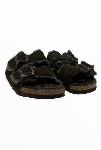 Quattro Stagioni black suede Arizona shearling sandals with adjustable buckles and cozy shearling lining.