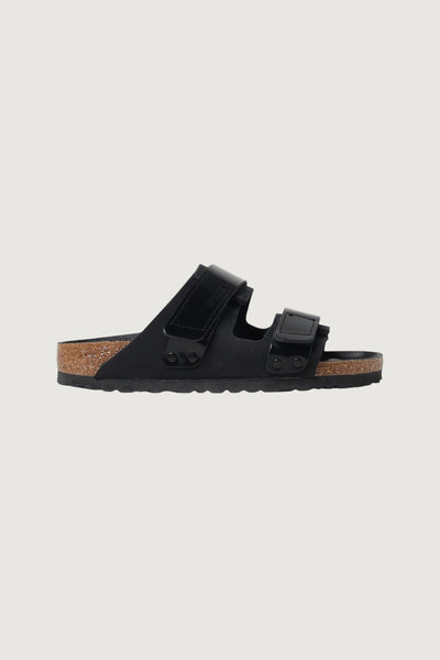 Quattro Stagioni Uji black leather double strap sandals with adjustable velcro and cork footbed.