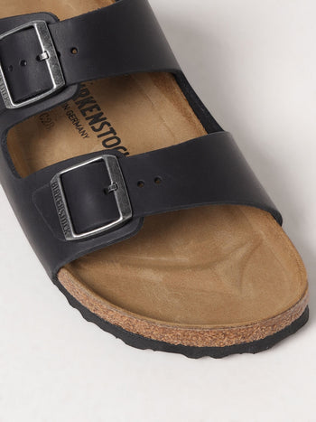 Quattro Stagioni Arizona black leather sandals with two adjustable buckles and cork footbed.
