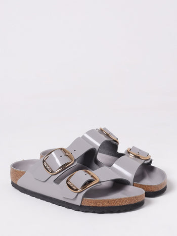 Quattro Stagioni Arizona big buckle shine grey patent leather sandals with gold hardware.