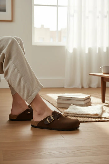 Quattro Stagioni Boston clogs in dark brown suede with adjustable buckle strap. Comfortable slip-on shoes for casual wear.