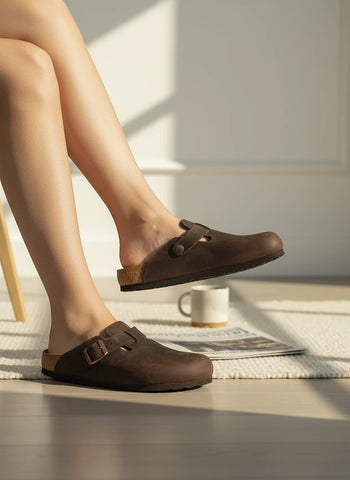 Quattro Stagioni Boston clogs in dark brown distressed leather with adjustable buckle strap and cork footbed.